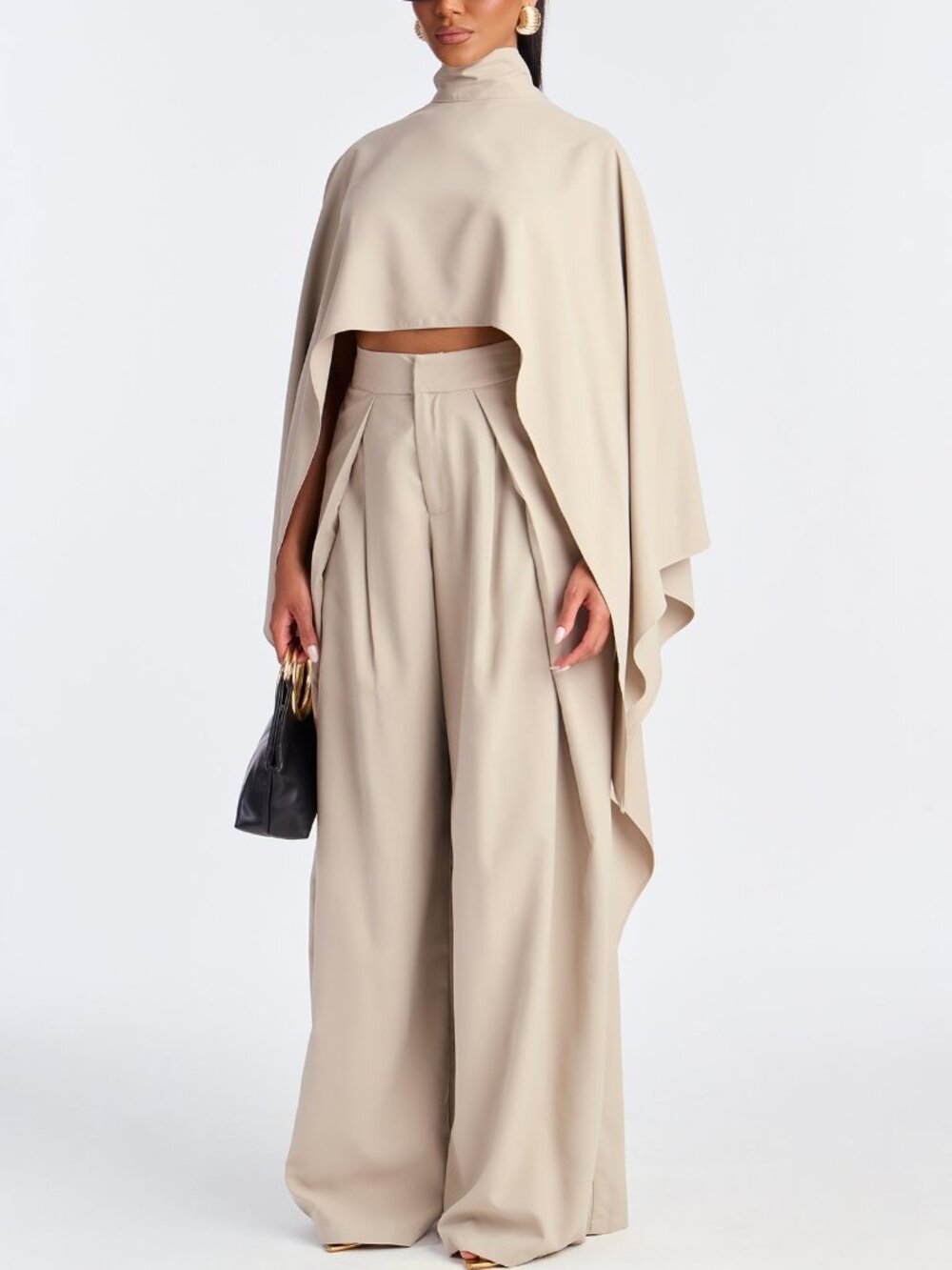 Elegant women's two-piece beige trouser suit